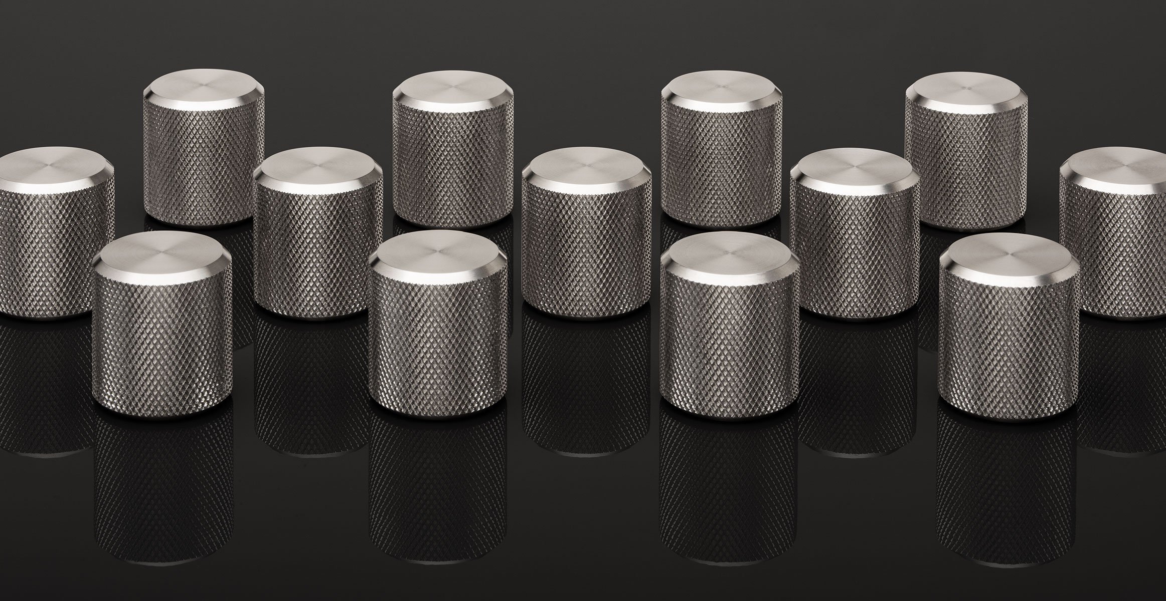 Kor cabinet knobs in stainless with knurled texture
