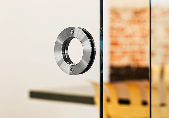 The Ebba sliding door pull in Skylab’s Black Box Building, Portland, OR. Shown in Brushed Stainless finish.