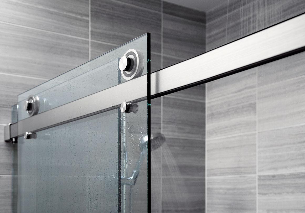 Rorik barn door style glass shower door system installed in residential environment